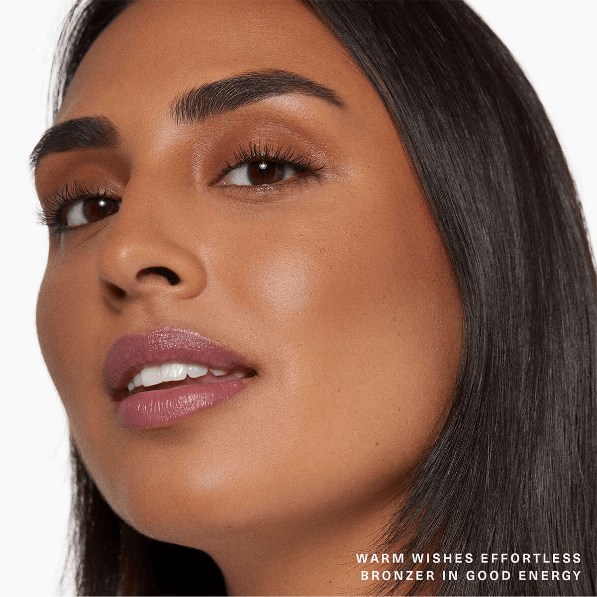 RARE BEAUTY WARM WISHES EFFORTLESS BRONZER STICK (BARRA BRONCEADORA)